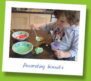 My daughter decorating biscuits